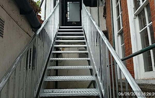 Down the rickety stairs and up a brand new set of steel fabricated ones!